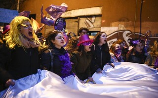 Protesters shout slogans as they march to mark International Women's Day in Istanbul, Turkey, Tuesday, March 8, 2022